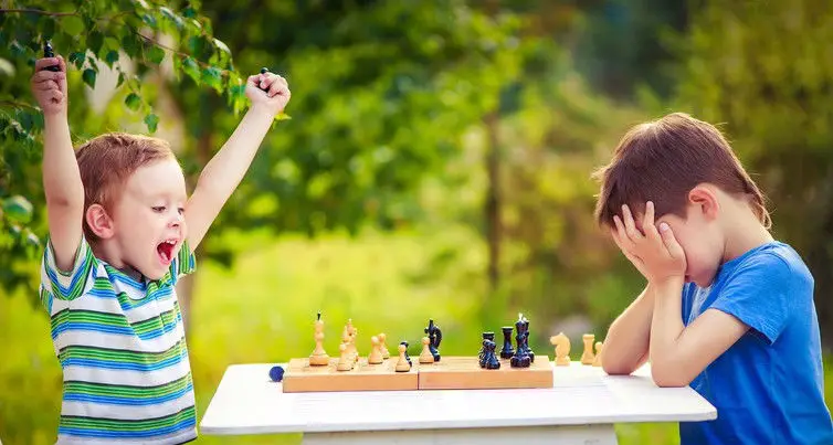 Two Kids Playing Chess