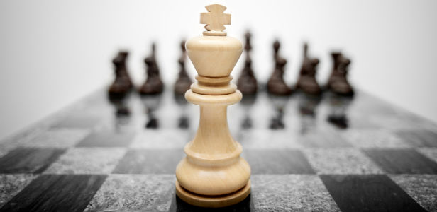 Chess King pieces Against A Chess Set