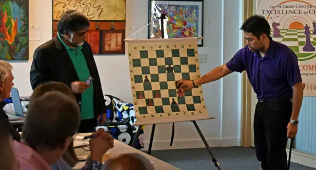 Sunil Weeramantry with a special guest, Hikaru Nakamura, during a teacher training workshop.